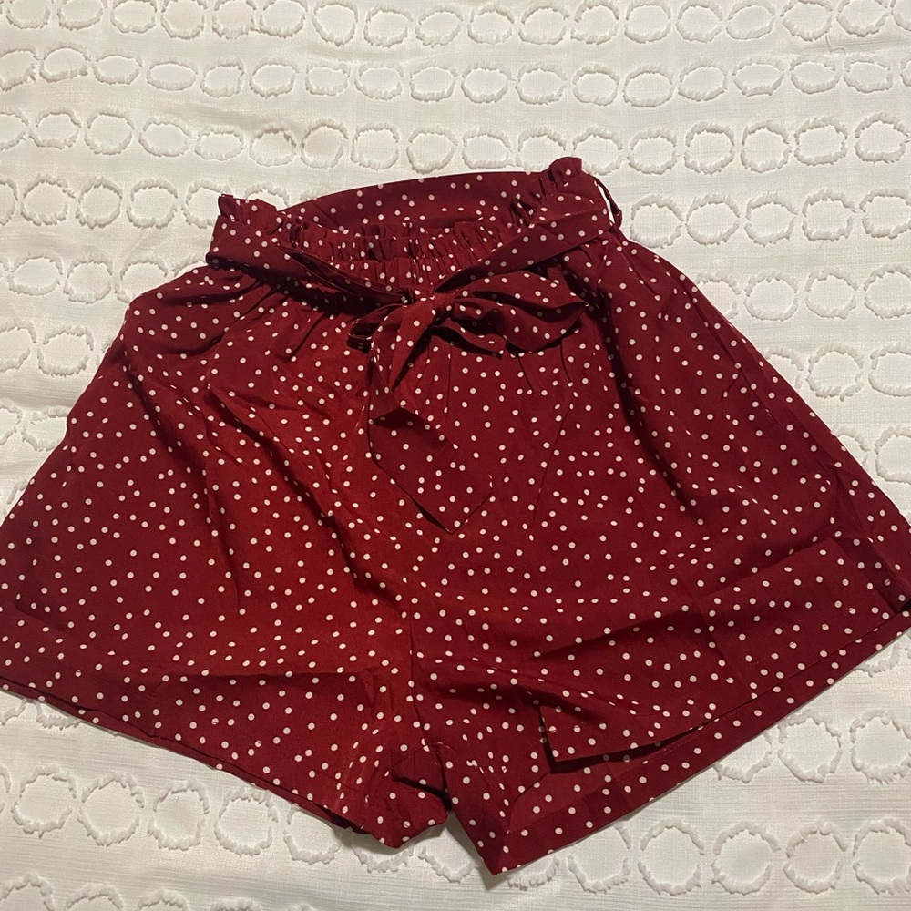 Red & White poke a dot. Perfect condition only been tried on.